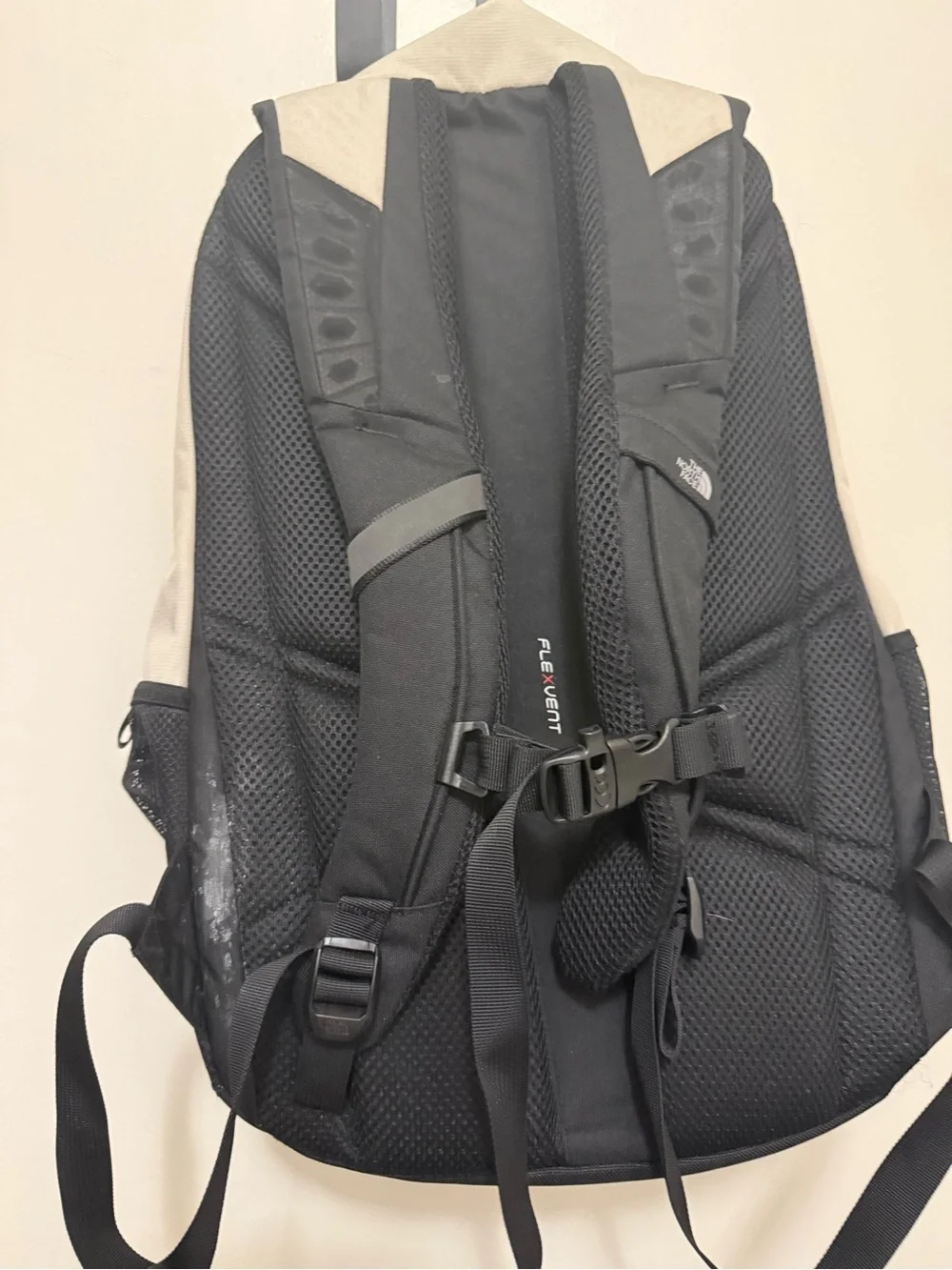 The North Face Two-Tone Beige and Black Backpack with Bungee Front
